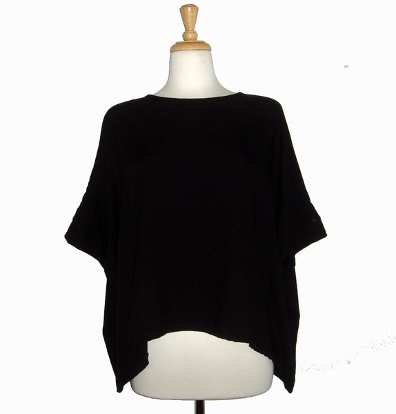 Loose fitting black top wide and flowy